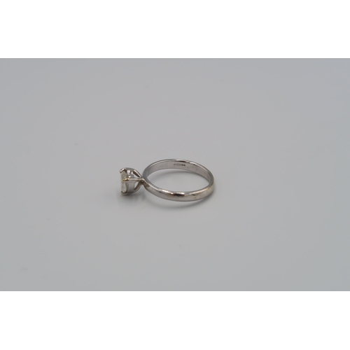 84 - An 18ct white gold ring with heart shaped diamond estimated 0.70ct, I/J 1/2, size M 1/2, approx 3.17... 