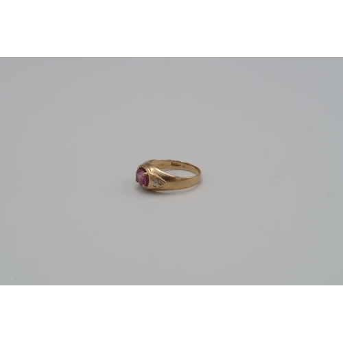 9 - A pink sapphire and diamond dress ring. Size K 1/2. Stamped 14K. Weight approx 2.58 grams.