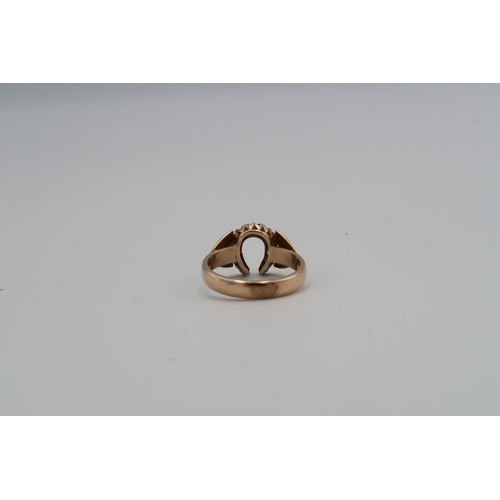 90 - An 18ct yellow gold (tested) diamond horseshoe ring size U 1/2, total weight approx 6.63 grams