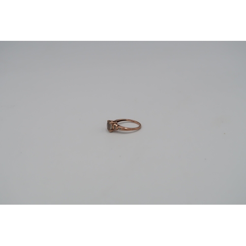 154 - A 9ct Rose Gold diamond dress ring. Size O, approx weight 2.2 grams