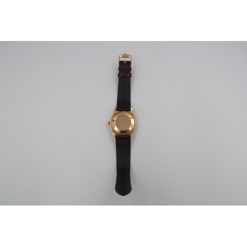 318 - A Rolex Oyster Perpetual Date Midi Wristwatch in 18ct Yellow gold case, 3cm across face. On a Rolex ... 