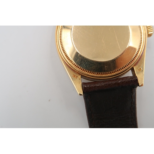 318 - A Rolex Oyster Perpetual Date Midi Wristwatch in 18ct Yellow gold case, 3cm across face. On a Rolex ... 