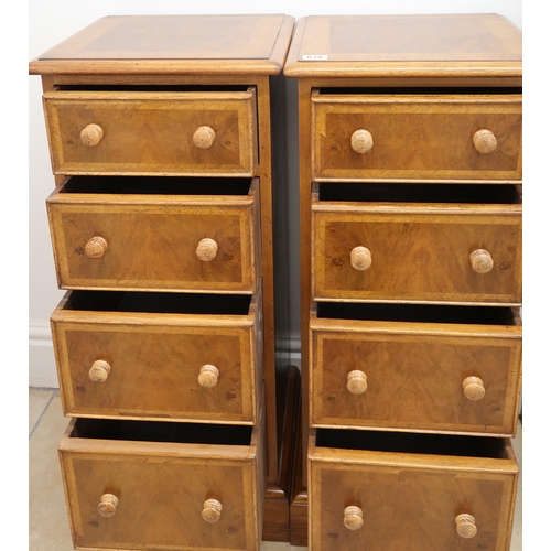 678 - A pair of Walnut bedside tables of four drawers each. 33cm deep x 33cm wide x 79cm high. Built by a ... 