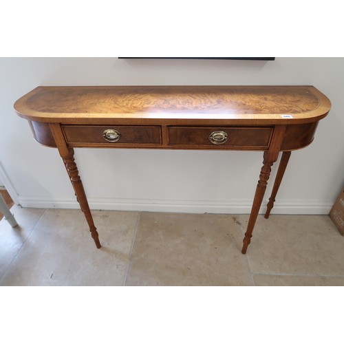 680 - A Walnut D end Hall table with three drawers to front, 77cm high x 119cm wide x 77cm high. Built by ... 