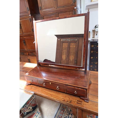 670 - A mahogany table top dressing mirror, mirror over three drawers.