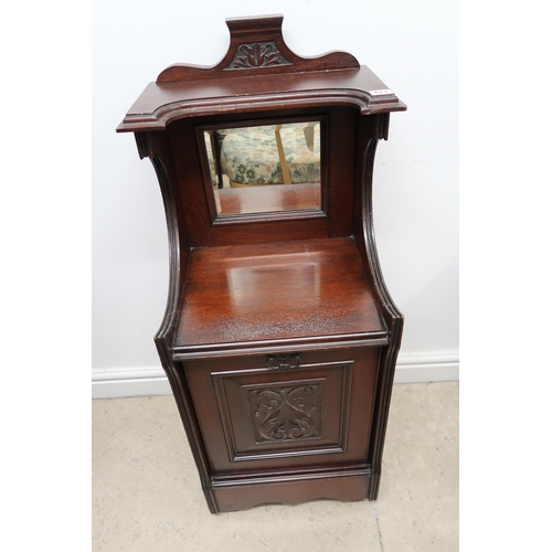 673 - A late 19th century Mahogany coal purdonium with bucket.