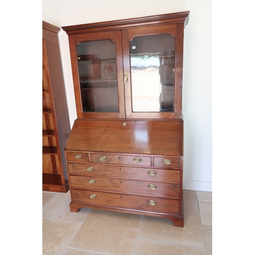 674 - A Georgian mahogany Bureau bookcase, Cornice over twin glazed doors over fall front opening to revea... 