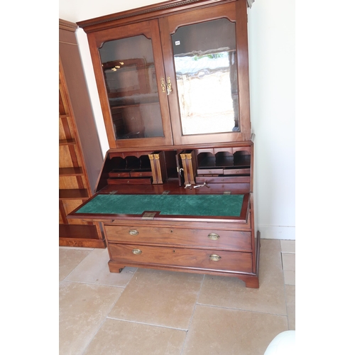 674 - A Georgian mahogany Bureau bookcase, Cornice over twin glazed doors over fall front opening to revea... 