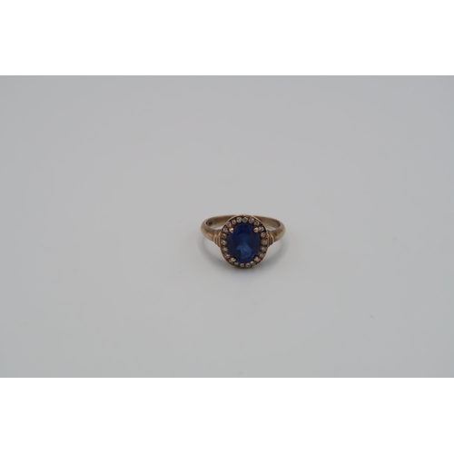 77 - A diamond and synthetic sapphire cluster ring. Stamped 9ct. Size R. Weight approx 4.63 grams. Togeth... 