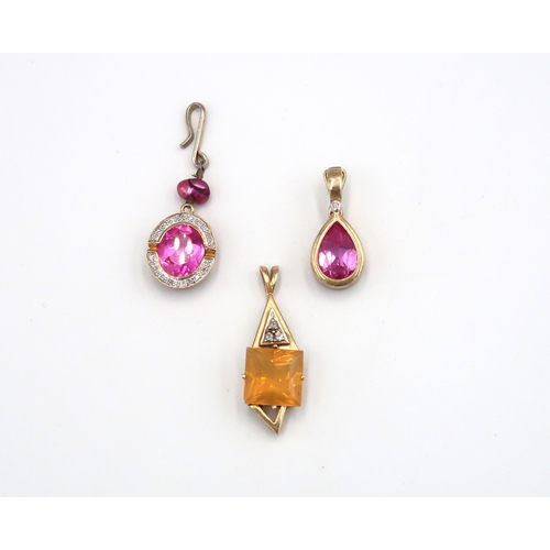 82 - A 9ct yellow gold earring with oval cut pink blush stone to centre surrounded by small diamonds with... 