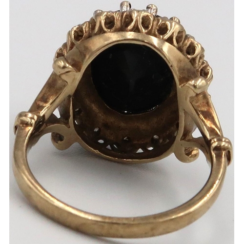 20 - An onyx and diamond unmarked cluster ring Marked 333 8ct. 5.88grams Size M/N