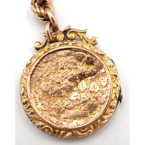 24 - A 9ct gold figaro watch chain with T bar, approx 22 grams, and a 9ct gold medallion and a gold plate... 