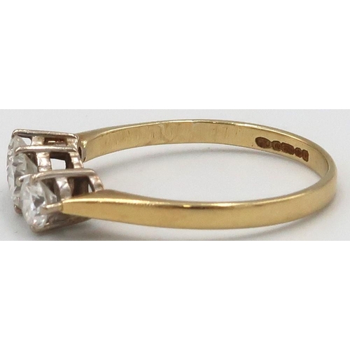 45 - An 18ct Yellow Gold three stone diamond ring. Estimated total diamond weight 0.65ct. Estimated colou... 