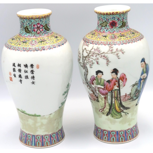 478 - A pair of hand painted Oriental famille rose ceramic vases, floral border to top and geometric borde... 