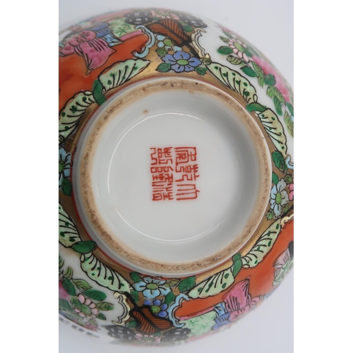 483 - An Oriental Cantonese bowl decorated with figures amongst background, 7cm high x 15cm diameter