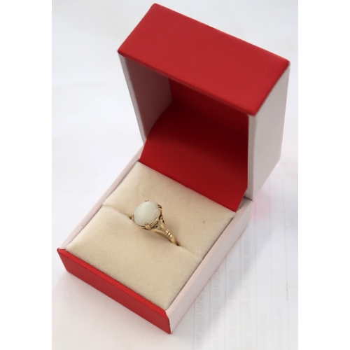 50 - A 9ct Yellow Gold dress ring with oval opal to shoulder, Size O 1.7grams.