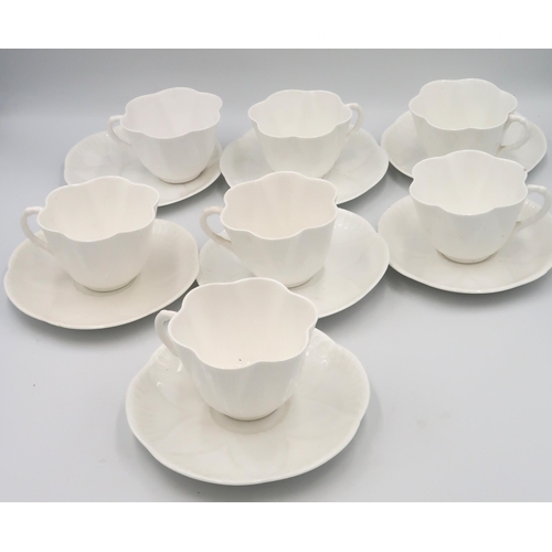 516 - Seven Shelley Daisy shape cups and saucers, one A/F