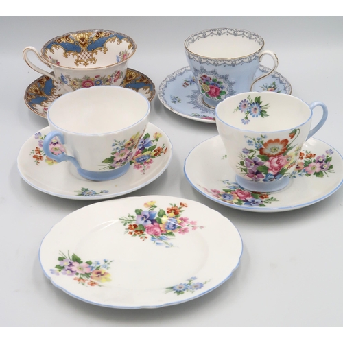 517 - A Shelley Crochet pattern cup and saucer, A Summer bouquet cup and saucer and Trio, and a Gainsborou... 