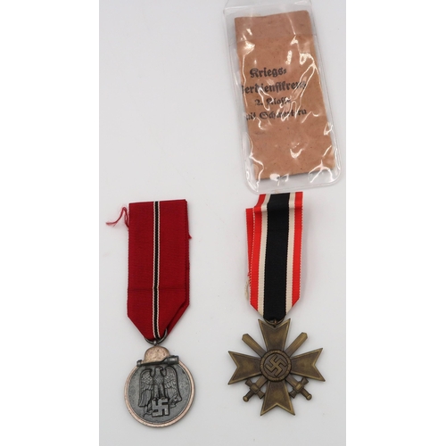 520 - A war merit medal with swords 2nd class, and a German Eastern front medal 1941-42