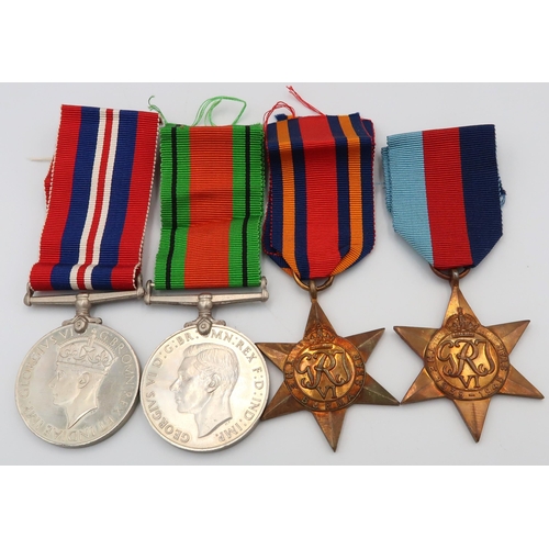 543 - Four WW2 Medals including 1939-45 star, Burma star, 1939-45 War medal, and Defence medal.