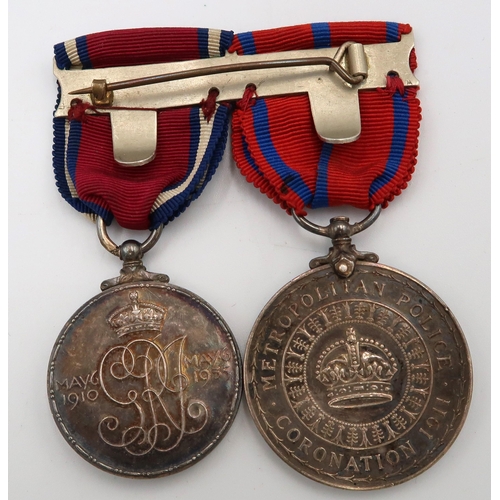 544 - Three medals including 1911Metropolitan Police Coronation, George V commemorative medal and a for Ex... 