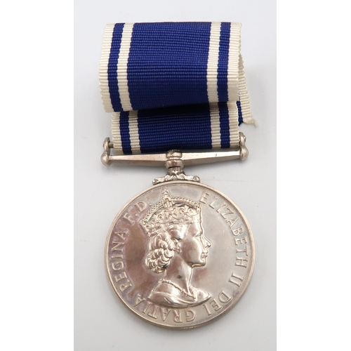 544 - Three medals including 1911Metropolitan Police Coronation, George V commemorative medal and a for Ex... 