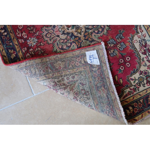 574 - A Hand Knotted Azerbaijan Rug. 1.30m x 0.95