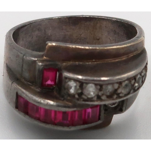 61 - A French deco style dress ring with synthetic ruby's to shoulder. Size L/M 7.2grams