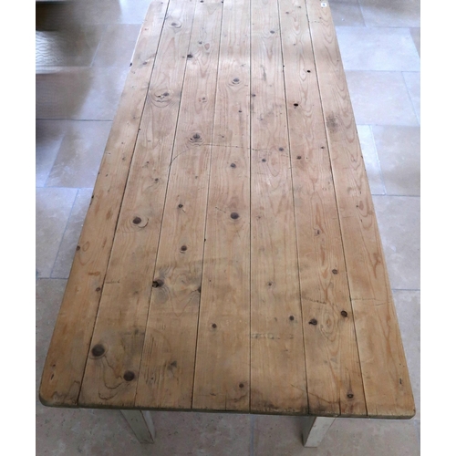 630 - A Rustic pine kitchen table grey painted base with stripped top. 183cm x 76cm wide x 75.5cm high.