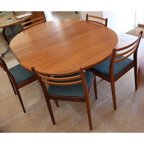 632 - A Mid 20th Century G-Plan extendable dining table and five dining chairs. extended size 167cm long, ... 