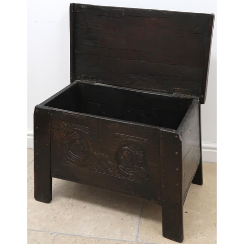 638 - A small carved Oak Coffer with lift top.