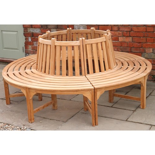 660 - A new ex display teak tree seat - this retails online at around £1,500