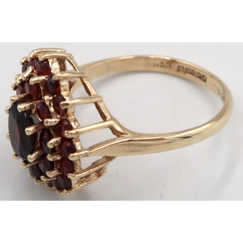 132 - A 9ct yellow gold garnet cluster ring, head size approx 17mm x 15mm, size O, weight 3.78 grams