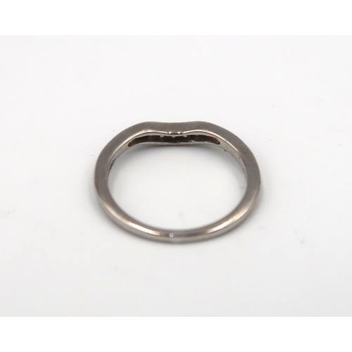 163 - A platinum and diamond wishbone ring. Size J 1/2. Weight 1.37 grams