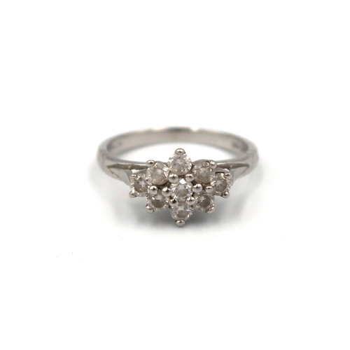 164 - A platinum brilliant cut diamond cluster ring. Estimated total diamond weight 0.50ct. Size K. Weight... 