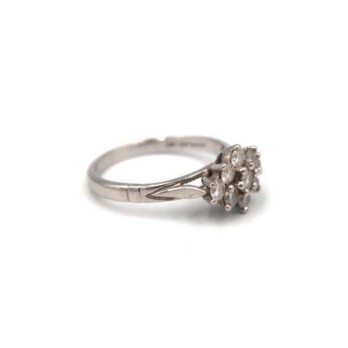 164 - A platinum brilliant cut diamond cluster ring. Estimated total diamond weight 0.50ct. Size K. Weight... 