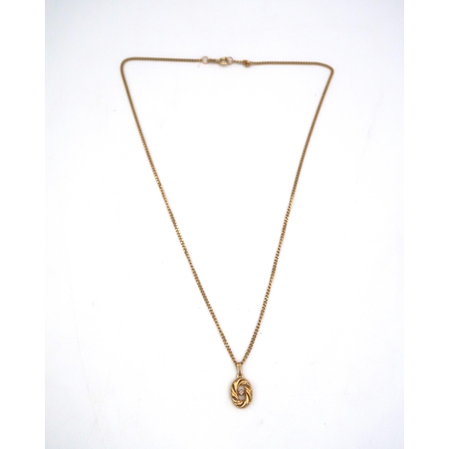 170 - A 9ct gold oval openwork pendant with diamond highlight. Suspended from a curb link chain. Weight 4.... 