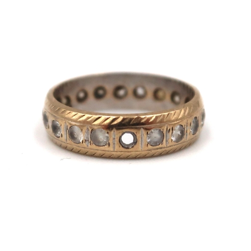 172 - A 9ct gold white stone full eternity ring. Size K. Weight 2.49 grams. One stone missing.