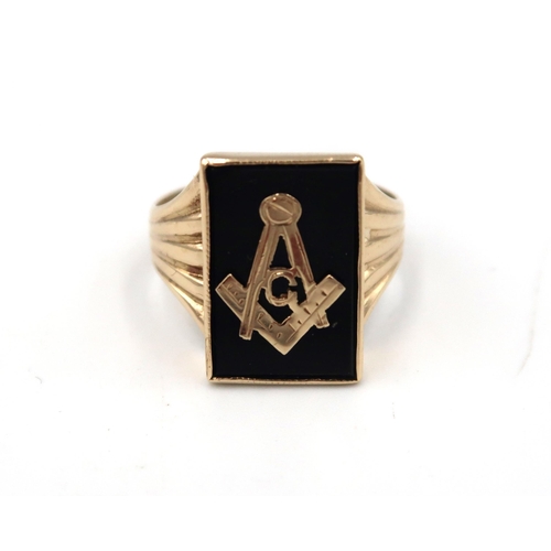 175 - A 9ct yellow gold Masonic ring - head size approx 18mm x 13mm - ring size approx S/T - hallmark for ... 