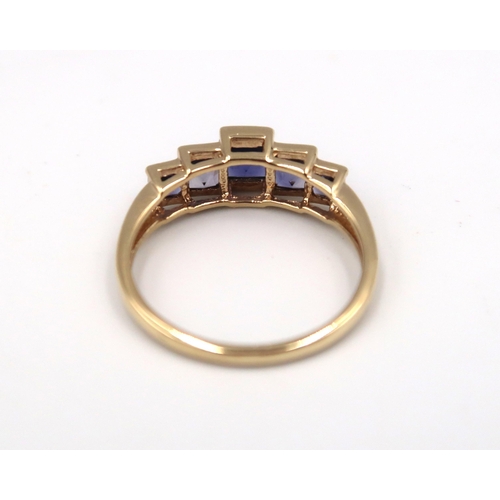 183 - A 9ct yellow gold five stone Tanzanite ring - head size approx 18mm x 7mm - ring size approx S/T - t... 