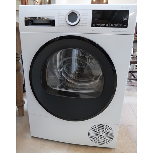 699 - A Bosch Series 6 Self cleaning condensing Tumble dryer, 9Kg load. 60 x60 x 84cm high.