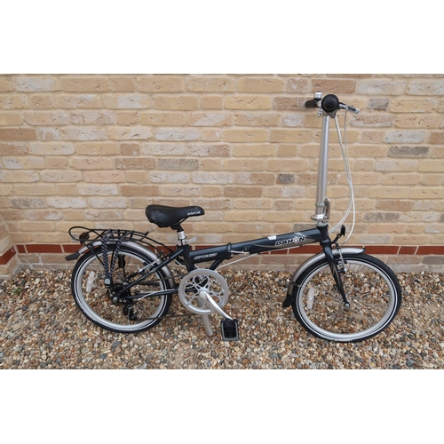 701A - A Dahon Hit folding bike in black.in good condition with a carry bag