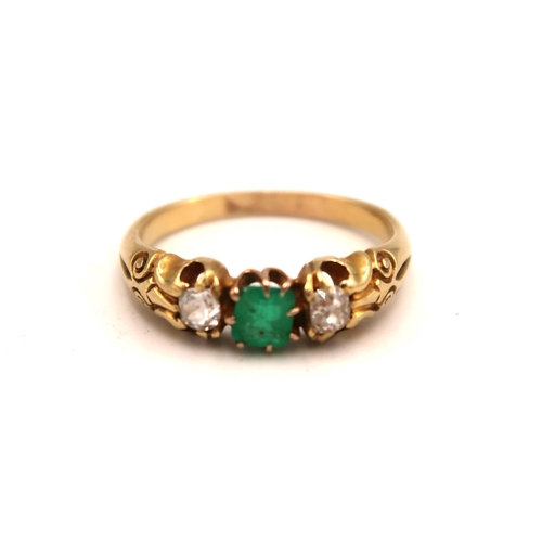 101 - An 9ct yellow gold (tested) diamond and green stone ring, size R, approx 4.4 grams