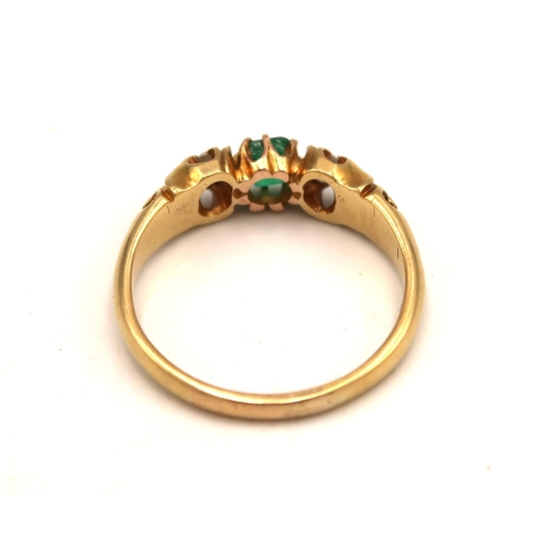 101 - An 9ct yellow gold (tested) diamond and green stone ring, size R, approx 4.4 grams