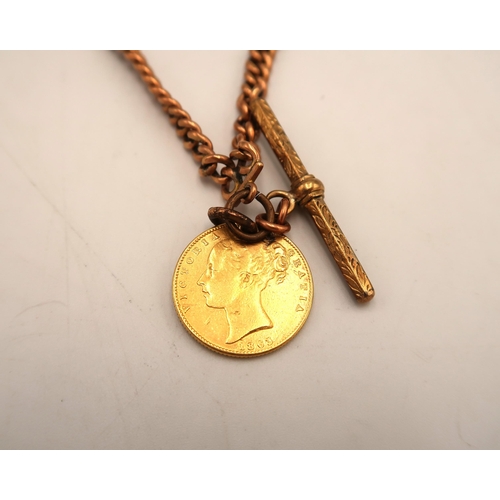 110 - An 1863 shield back full gold sovereign on a 9ct hallmarked chain with T bar, approx 36.8 grams