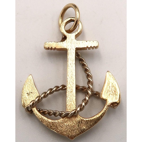 112 - A marked 14K pendant in anchor form, approx 6.4 grams