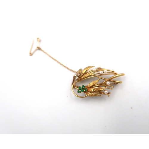 123 - A marked 18ct yellow gold and diamond brooch, 7.2grams