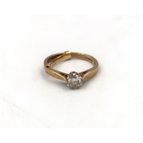 124 - A 9ct yellow gold and diamond solitaire ring, size I, 2grams