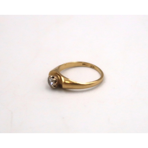 131 - An 18ct yellow gold and diamond solitaire ring, Size K, 3.7grams.