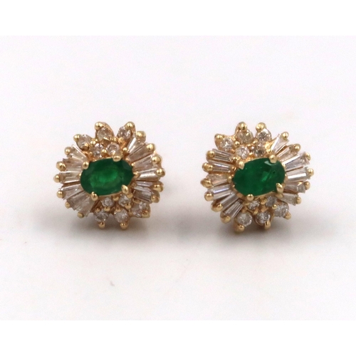 144 - A pair of emerald and diamond cluster earrings. Test 14ct gold or higher. Weight 5.57 grams